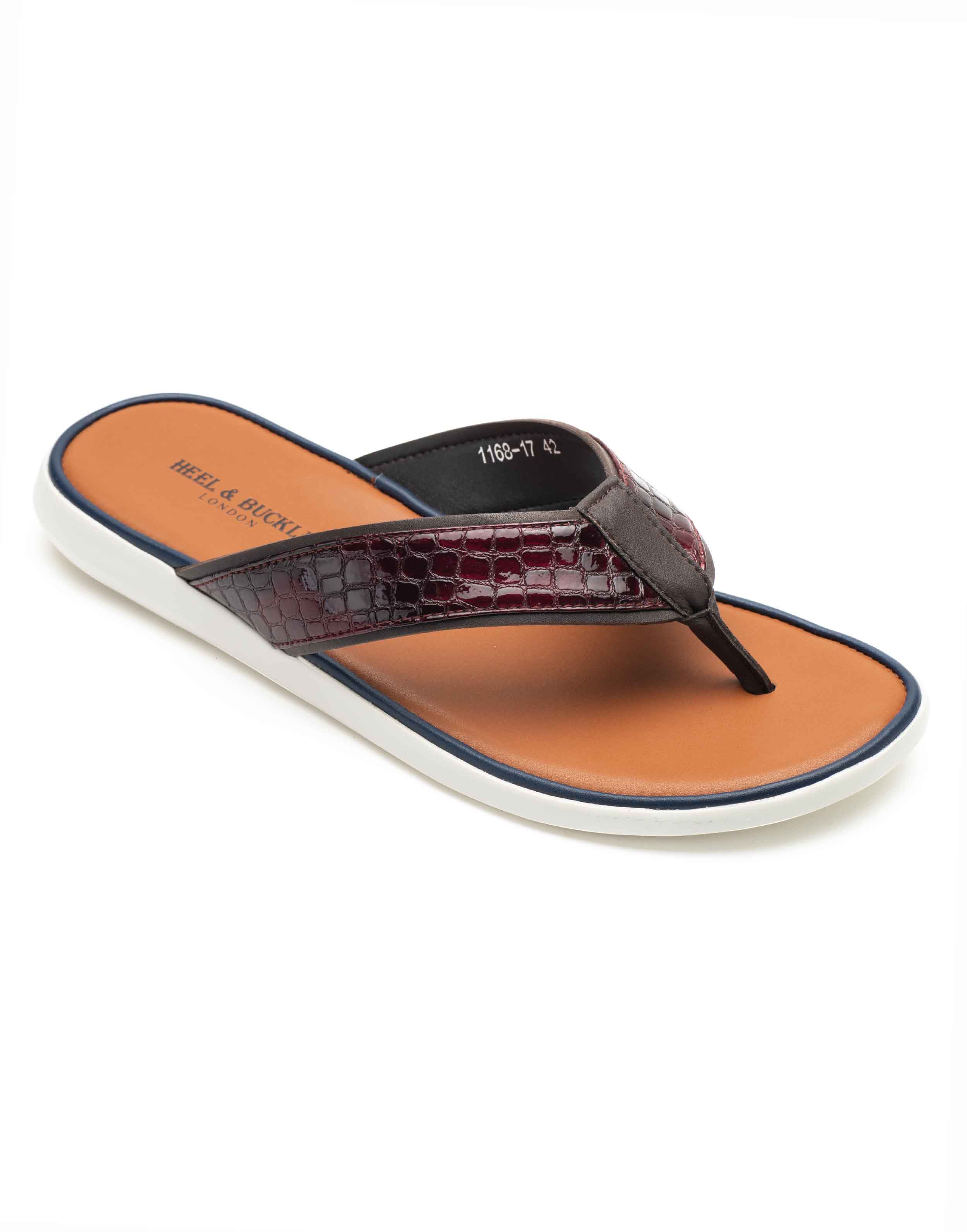 Buckle best sale flip flops